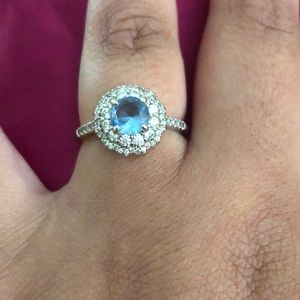Lab created light blue quartz on rhodium plated ring